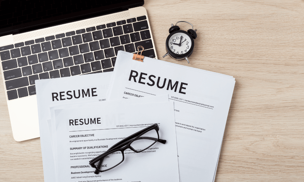 Use AI to Write Resumes on laptop